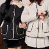 Fur Collar Puffer Coat - Sleek, wind-resistant coat with chic buckle closure.