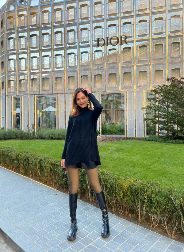 Turtleneck mini dress - Styled as a mini dress or a loose-fitting sweater.